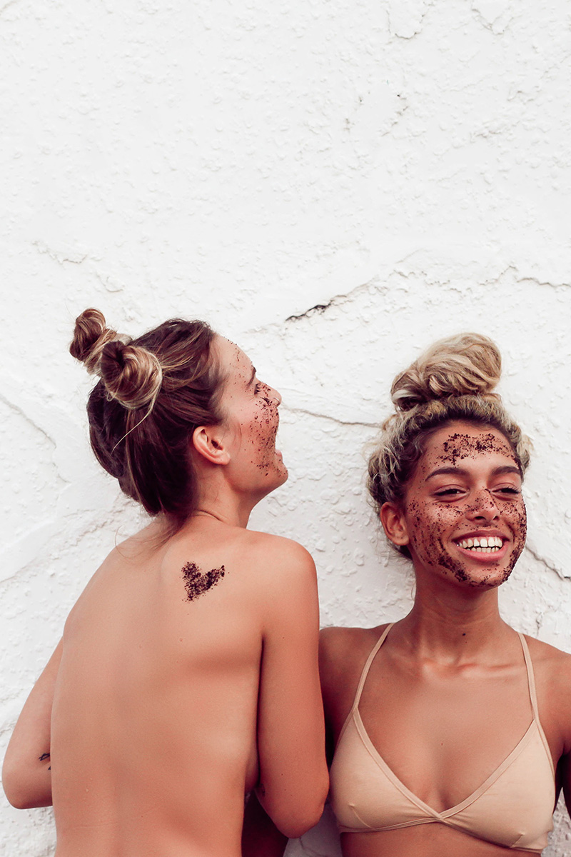 topless girl with coffee scrub on back